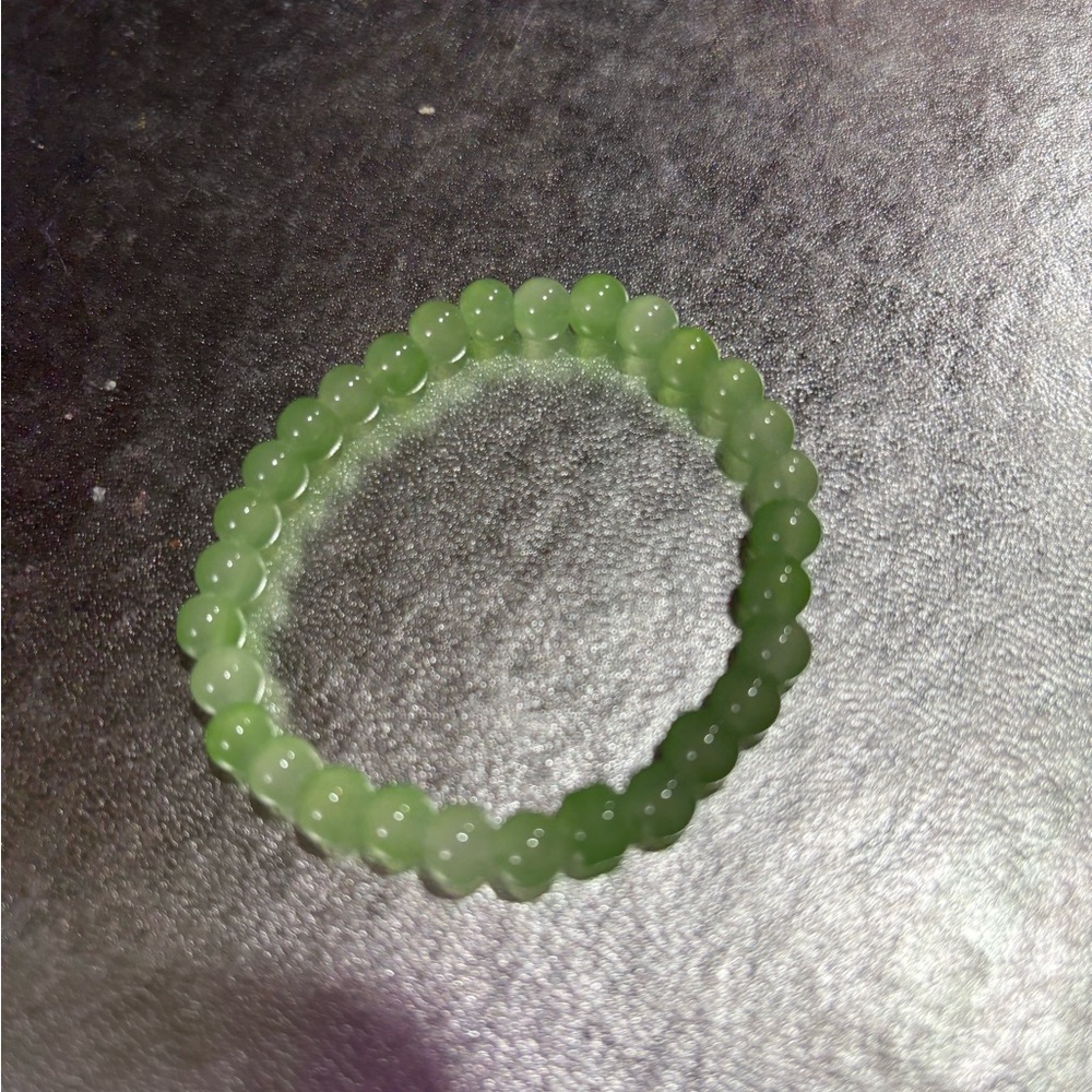 Light Green Beaded Bracelet with Semi-Transparent Finish